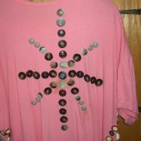 pink shirt with buttons--lots of buttons